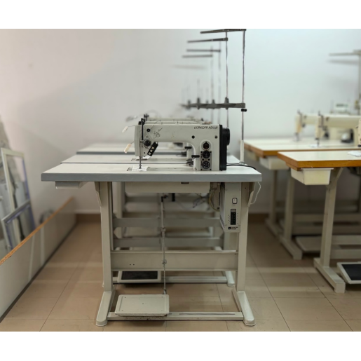 Masina de cusut liniar, automata, cu transport cu acul in material Durkopp 272